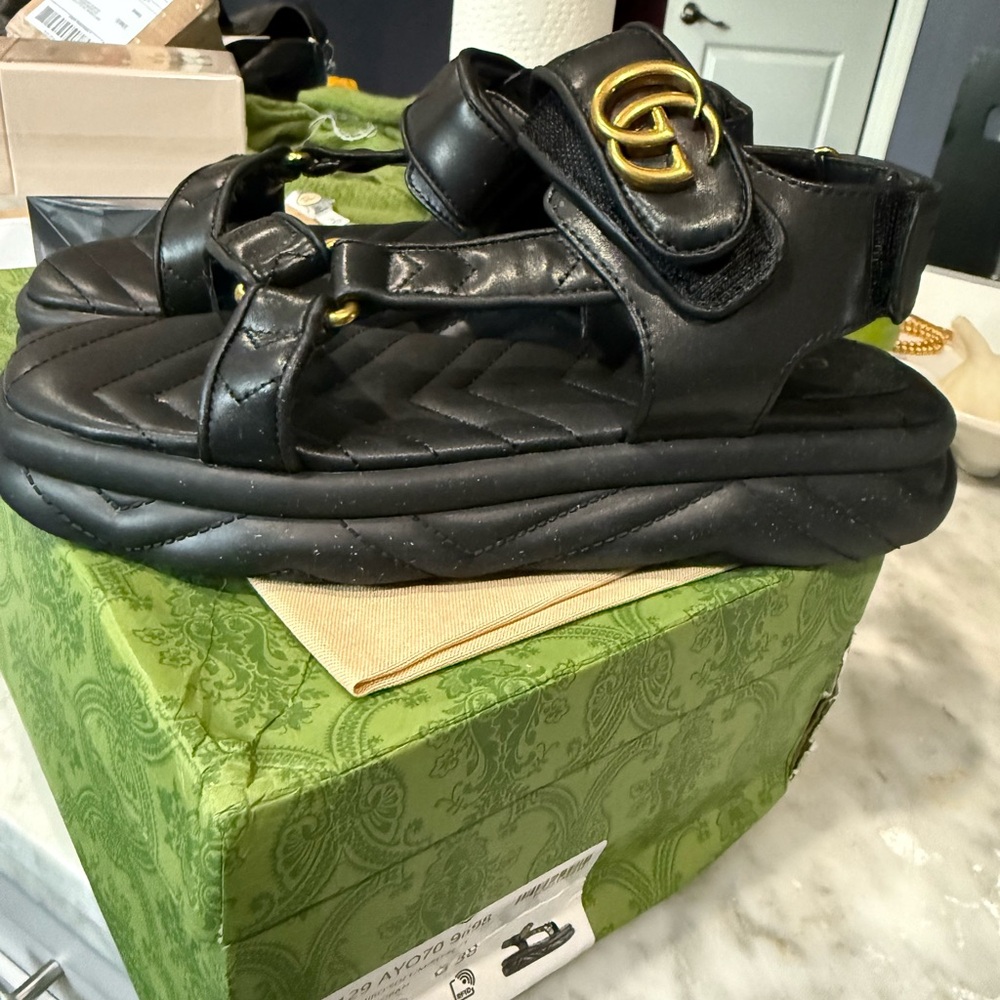 Black Quilted Sandals with Gold Logo